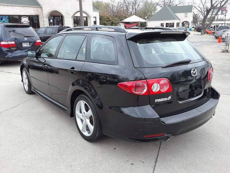 Illustration for article titled At $2,499, Could This Dimpled 2005 Mazda 6 Wagon Put a Dent in Your Wallet?